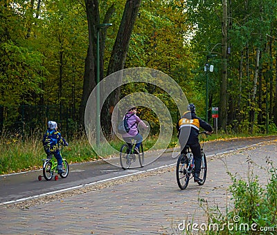 Walk in the woods on bicycles Editorial Stock Photo
