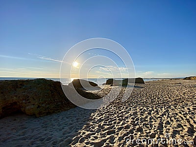 Walking along the sandy beach of Praia Da Gale in Algarve, south of Portugal Stock Photo