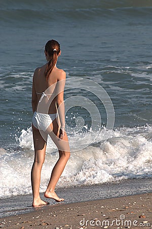 Walking on the Beach Editorial Stock Photo