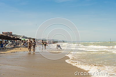 Walking on the beach at Silvi Marina Italy Editorial Stock Photo