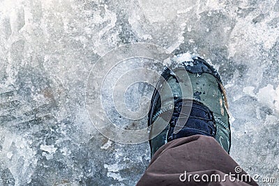 Walking boot on slush Stock Photo