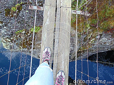 Walking a bridge in Norge Stock Photo