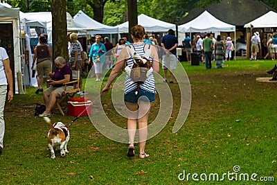 Walking Dog at Lititz Outdoor Fine Art Show Editorial Stock Photo