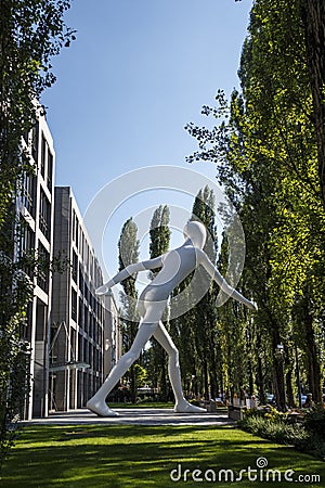 Walking Man sculpture in Munich, Germany, 2015 Editorial Stock Photo