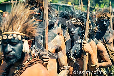 Walking men in costumes Editorial Stock Photo