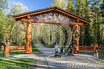 Walking mother with pram in nature Editorial Stock Photo