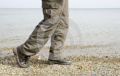 Walking next to the sea Stock Photo