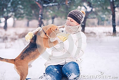 Walking with pet - winter active leisure time Stock Photo