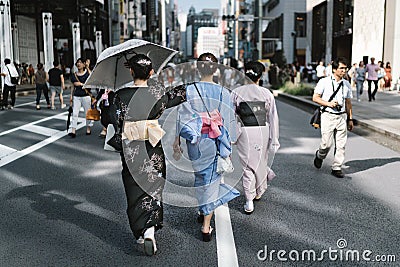 Walking Through Tokyo in Yukata Editorial Stock Photo