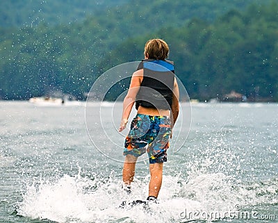 Walking on Water/Boy Skiing Stock Photo