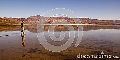 Walking on water in Greenland Editorial Stock Photo