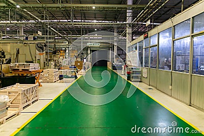 Walkway in the manufacture for operator use by not allow forklift passing. Safety first area in the Factory. Manufactory inside wa Stock Photo