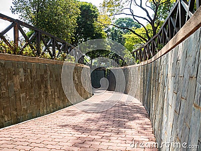 Walkway to Fort Canning Park Tunnel in Singapore Stock Photo