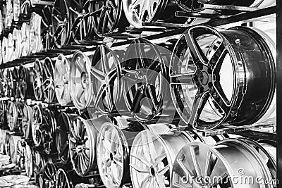 wall of alloy car wheels in store Stock Photo