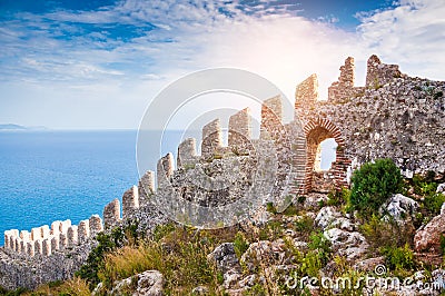 The wall of an ancient fortress on the hill in Alanya, Turkey Stock Photo