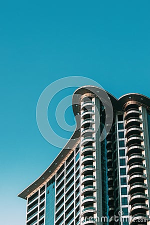 Wall With A Balcony Of New Empty Modern Multi-storey Residential Building House In Residential Area On Blue Sky Editorial Stock Photo