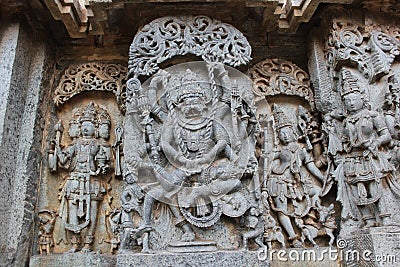 Hoysaleshwara Temple wall carving of Lord Narasimha killing the demon Stock Photo