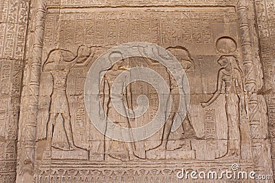 Wall carving on the walls of Khnum temple in Egypt Stock Photo