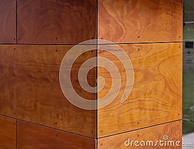 wall cladding using natural wooden boards. veneered plywood in Stock Photo