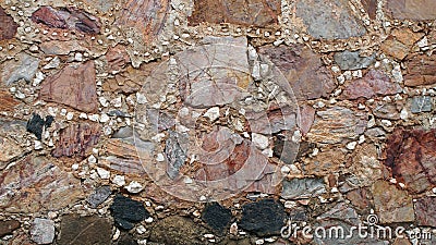 Stone wall with small gravel texture background Stock Photo
