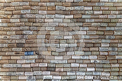 Wall covered in wine corks from various wineries Editorial Stock Photo