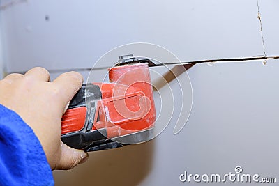 Wall cutting oscillating multi function power tool Stock Photo