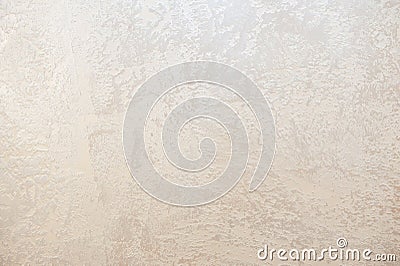 Wall decor Venetian decorative plaster with golden glitter paint. Background, abstraction. Apartment renovation concept Stock Photo