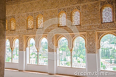 Wall decorated with Islamic ornaments inside Alhambra Palace - S Stock Photo