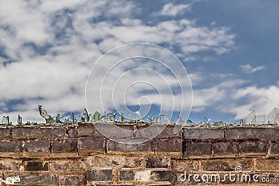 Wall with glass fragments , China. Stock Photo