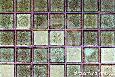 Wall from glass squares green color for background. Stock Photo