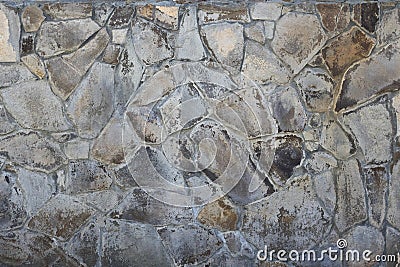 Wall Grunge texture background stone rock texture of mountains. Grungy aged stonework city. Damage front decor house Stock Photo