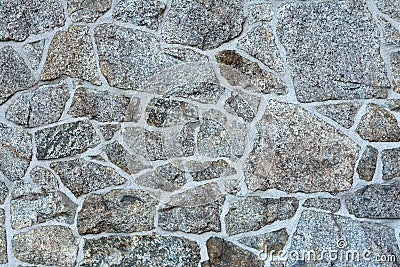 Wall with laying of natural stone of various textures Stock Photo