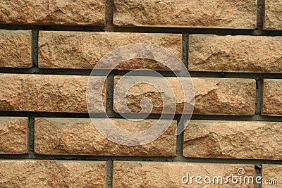 Wall of light uneven brick Stock Photo