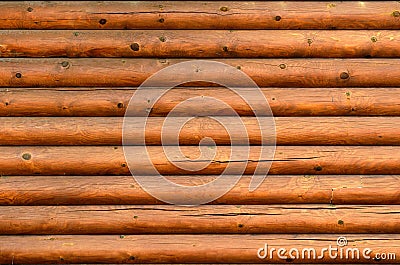 Wall of a log house wall with texture and wood knots Stock Photo