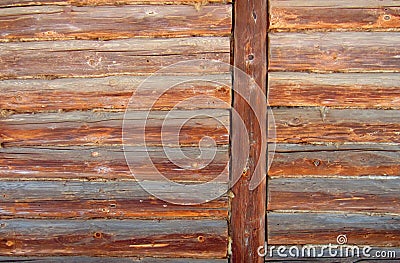 The wall of the log house. Wood is an eco-friendly natural material for the construction of a wooden house. Stock Photo