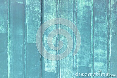 The wall is made of smooth painted strips. Empty background with stains of paint. A photograph of the blue colored bars. Stock Photo