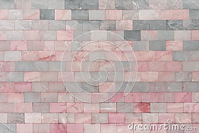Wall of marble pink tiles. Beautiful stone texture. Empty background Stock Photo