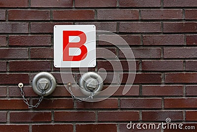 Wall mounted fire hydrant for emergency use Stock Photo