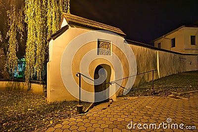 The wall near The Basilica minor of the Exaltation of the Holy Cross in KeÅ¾marok during evening Stock Photo