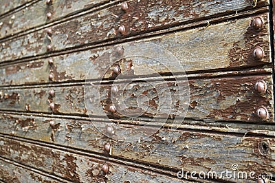 Old wooden facade with flaking painture Stock Photo