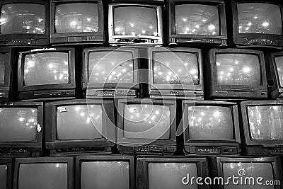 Wall of old vintage tube televisions background Stock Photo