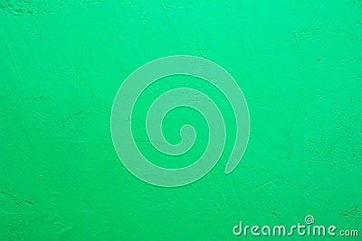 Wall painted in blue texture. Seamless texture of a light pale green concrete wall. Stock Photo