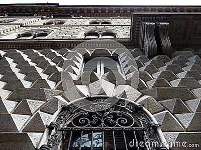 Wall with pyramidal ashlars in Milan. Italy. Stock Photo