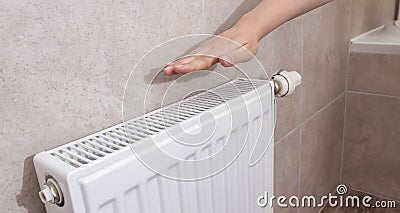 Wall radiator in the room. Increasing the price of water heating. Comfortable temperature in the house, industry. Dry Stock Photo
