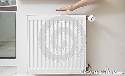 Wall radiator in the room. Increasing the price of water heating. Comfortable temperature in the house, industry. Dry Stock Photo