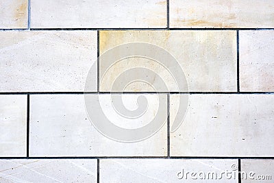 Wall with rectangular white stone slabs Stock Photo