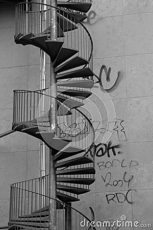 Wall and spiral stairs Stock Photo