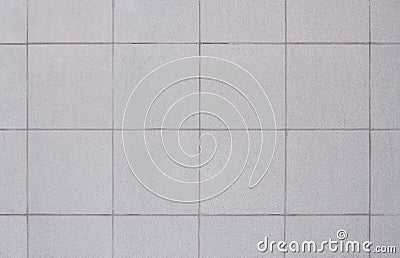 Wall with Square Gray Tiles Stock Photo