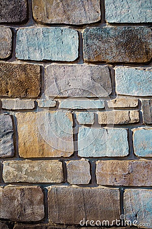 Wall of stone bricks. background and texture of cobblestones. Stock Photo