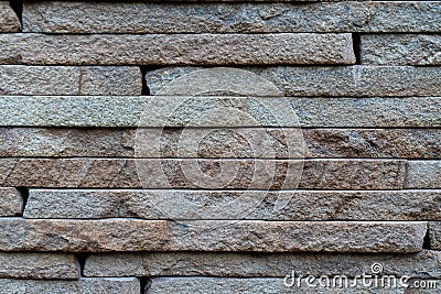 Wall surface texture of hewn stone, natural stone bricks Stock Photo
